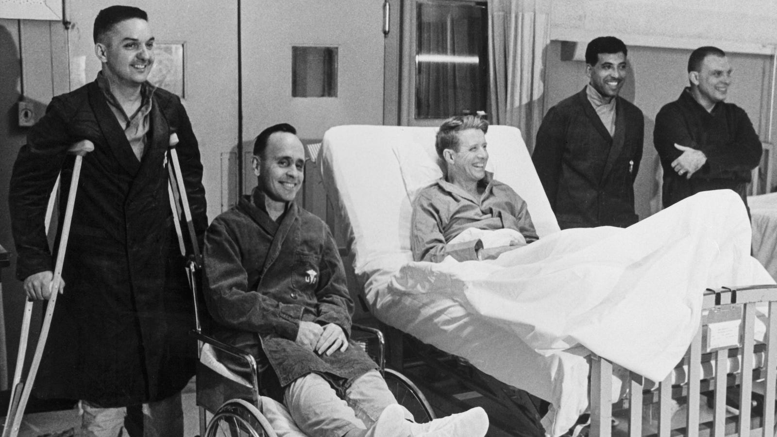 American military survivors of a B52 crash in Greenland smile for a photo in 1968.