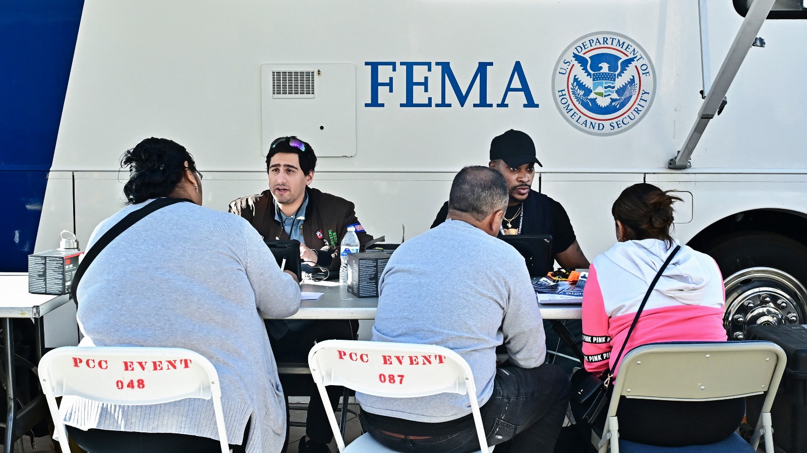 Fire victims meet with FEMA officials on January 14, 2025 in Pasadena, California, where a FEMA opened a recovery center to help residents who lost their homes or businesses.