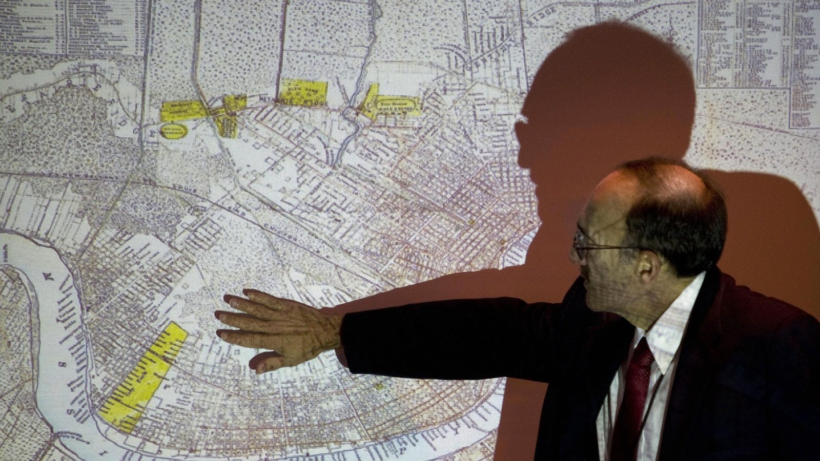 Al Naomi, a senior official with the U.S. Army Corps of Engineers, explains the New Orleans levee system at a public meeting. The Corps faced significant criticism for design flaws in its pre-Katrina levee network.