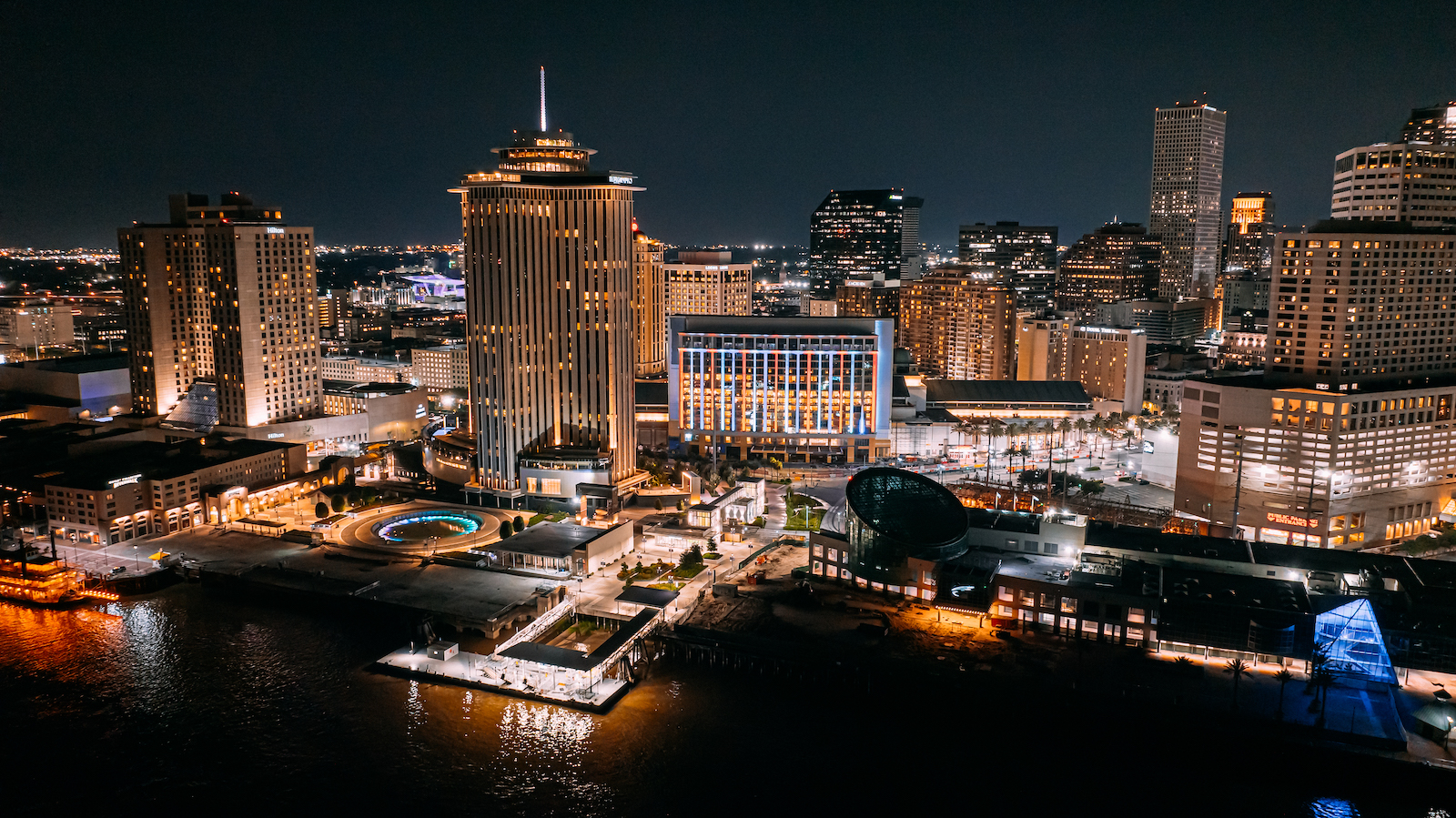 Aerial View of New Orleans, Louisiana, USA on the Mississippi River on a Summer Night