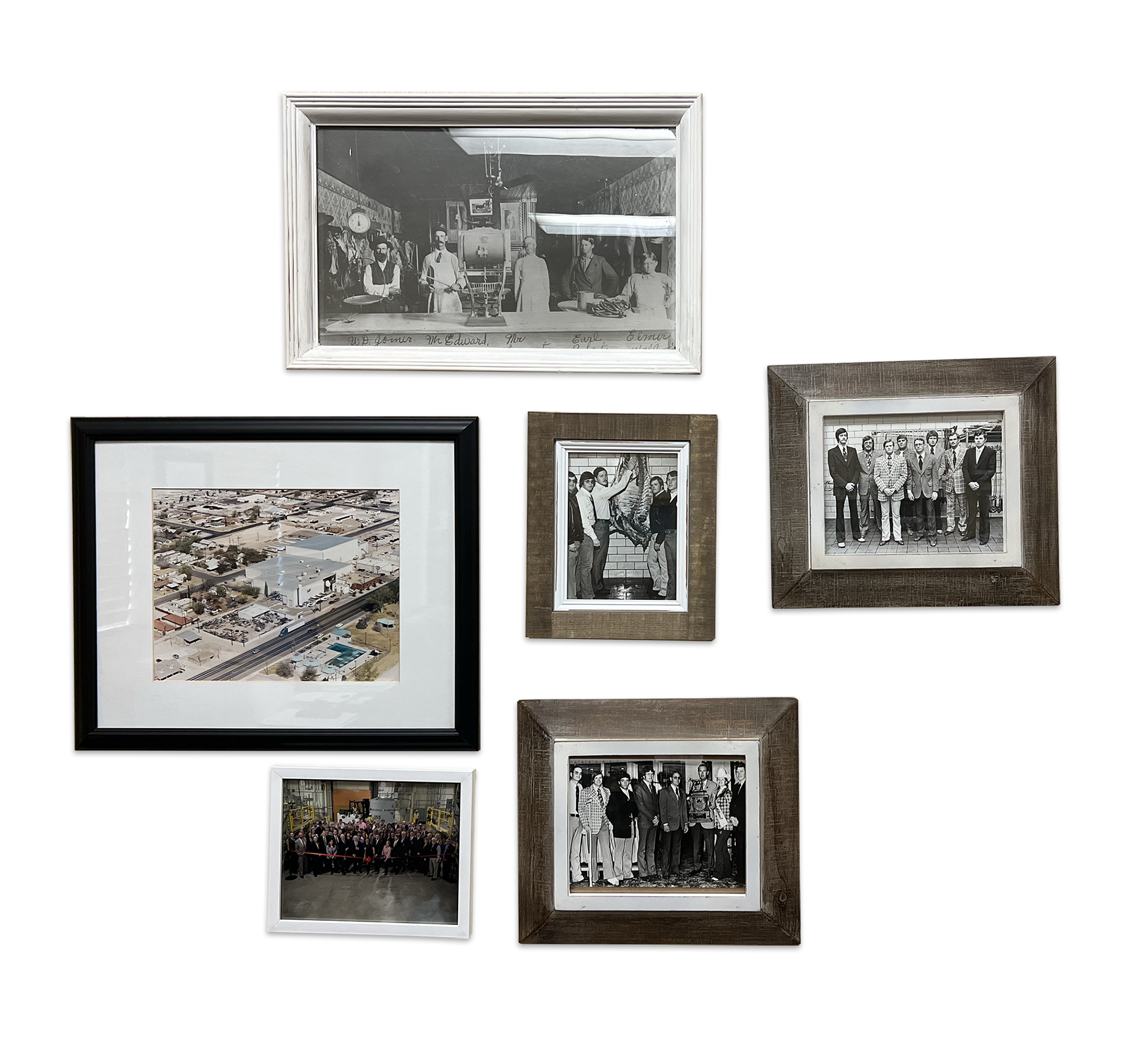 A gallery wall of photographs includes an old photo of men working at a butcher shop, three photos of young Sam Cobb, an aerial photo of the RMS Foods factory, and a photo of the RMS Foods staff.