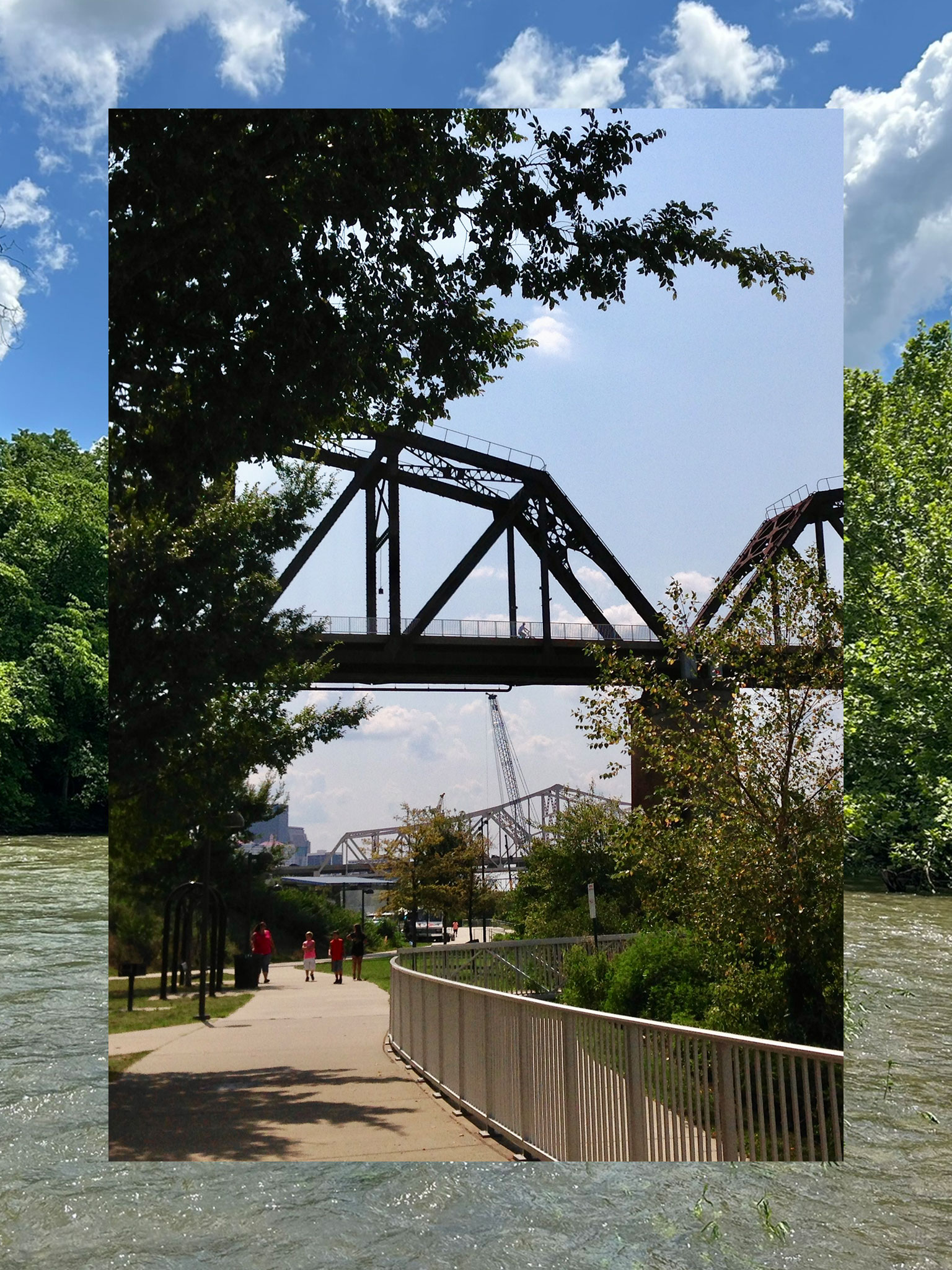 A collage consisting of two vertical photos, the outside functioning a border and the inside fully visible. The outside photo is a lake or river with trees and blue sky. The inner photo is a riverfront with bridge on a sunny day.